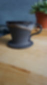 Black ceramic coffee pour-over side view