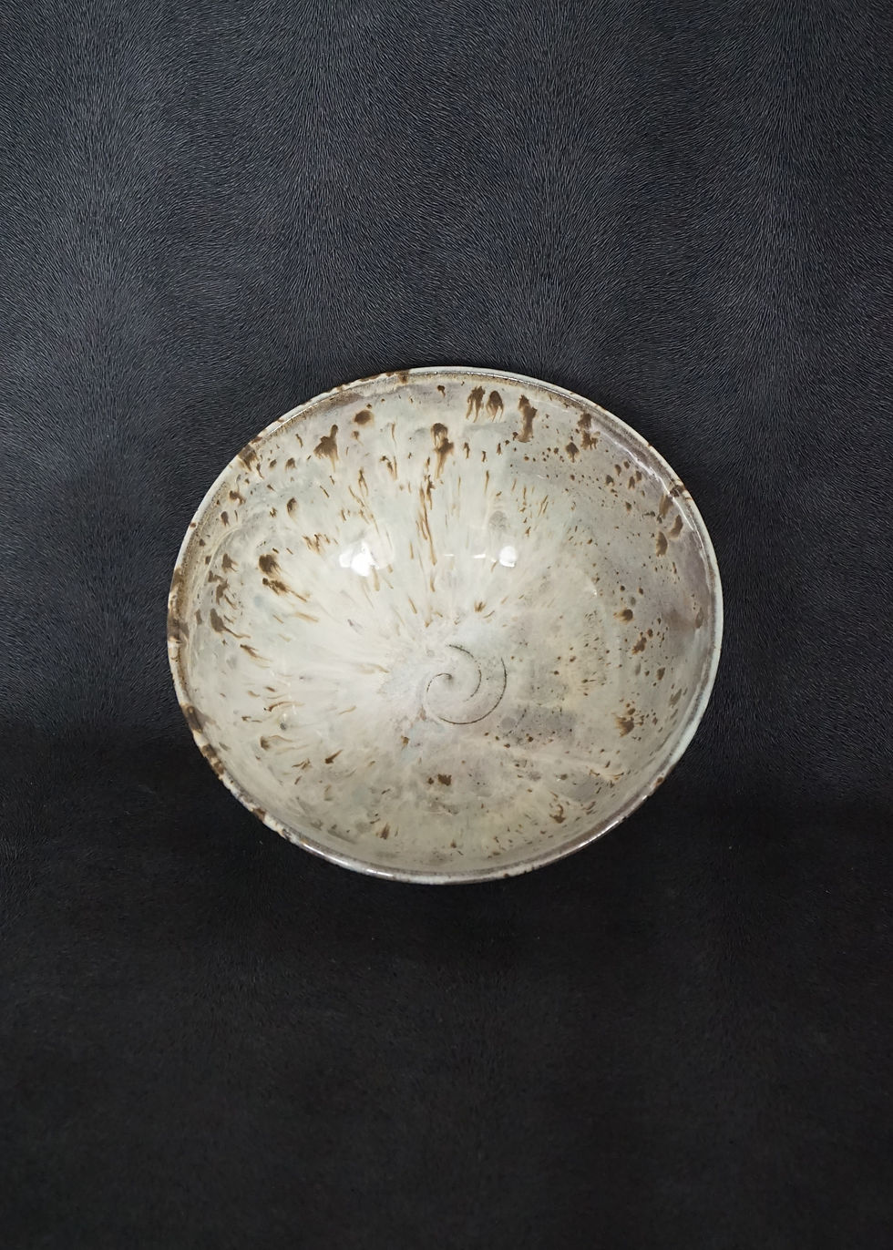 Thumbnail: Ramen bowl in a grey clay with a white, lavender and blue glaze top view