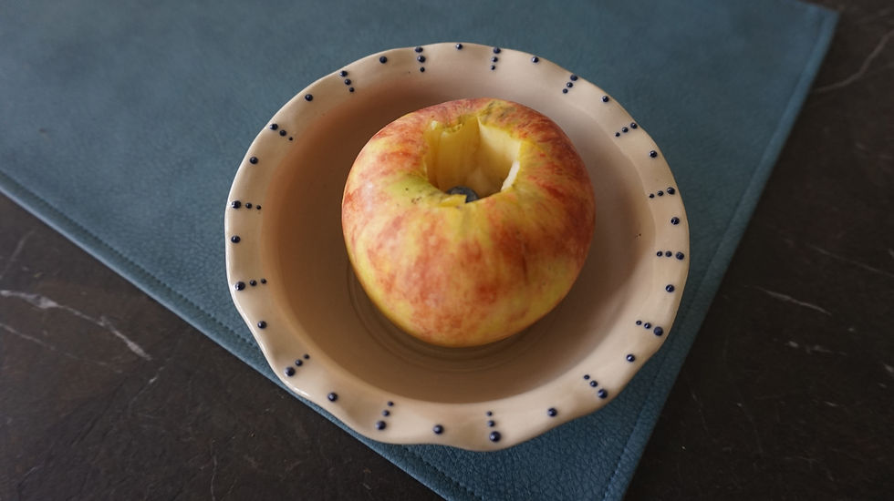 Thumbnail: Brown ceramic apple baker with an apple top view