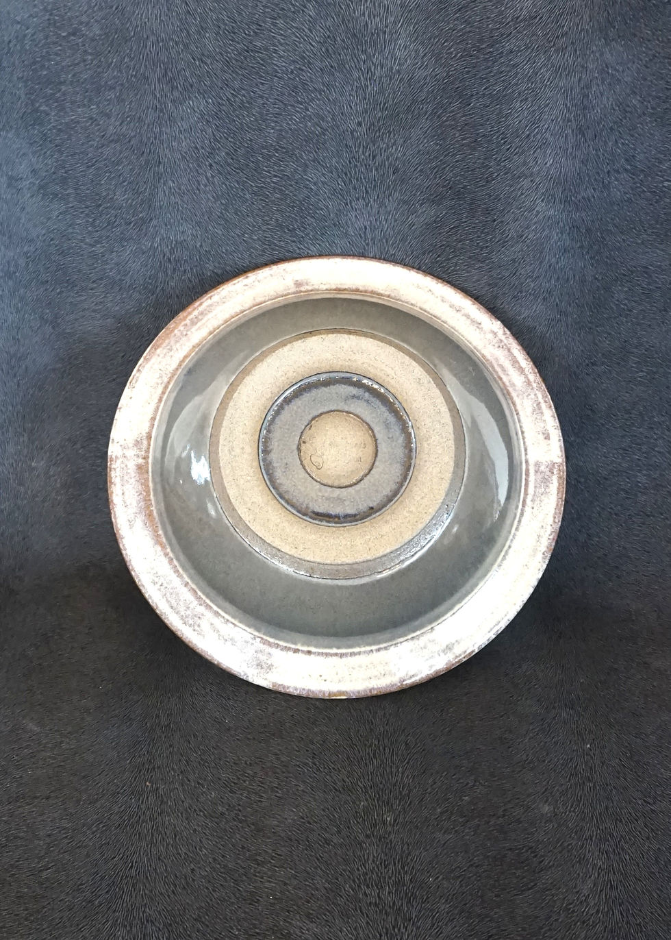 Thumbnail: ceramic carved pasta bowl with a grey and white glaze bottom view
