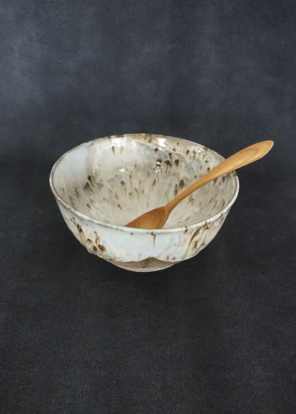 Thumbnail: Ramen bowl in a grey clay with a white, lavender and blue glaze top view