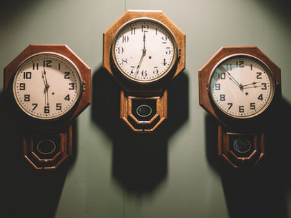 What are some innovative features found in modern wall clocks?