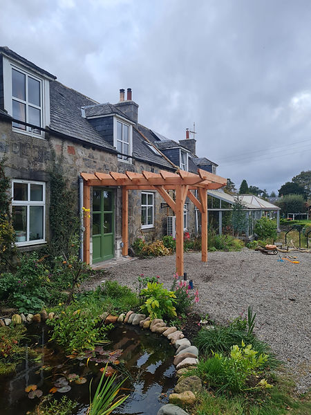 timber pergola stone cottage garden