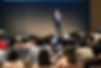 rear-side-of-audiences-sitting-and-listening-the-s-2022-12-16-03-29-31-utc.jpg
