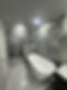 Modern bathroom renovation: freestanding tub, gray marble walls