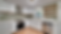 Renovated kitchen: white cabinets, new appliances, and stylish tile backsplash