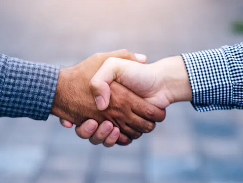 Supplier relations hand shake.png