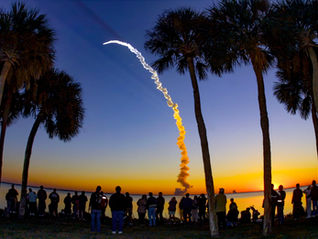 Space Shuttle Discovery lifts off from Kennedy Space Center at sunrise on March 8, 2001