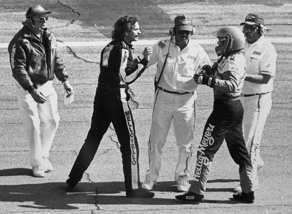 Winston Cup officials try to break up a fight between Kyle Petty and Bobby Hillin Jr., after a crash on the front straightaway during the Daytona 500, Daytona International Speedway, Daytona Beach, FL, February 14, 1993.  (Photo by Brian Cleary/www.bcpix.com)
