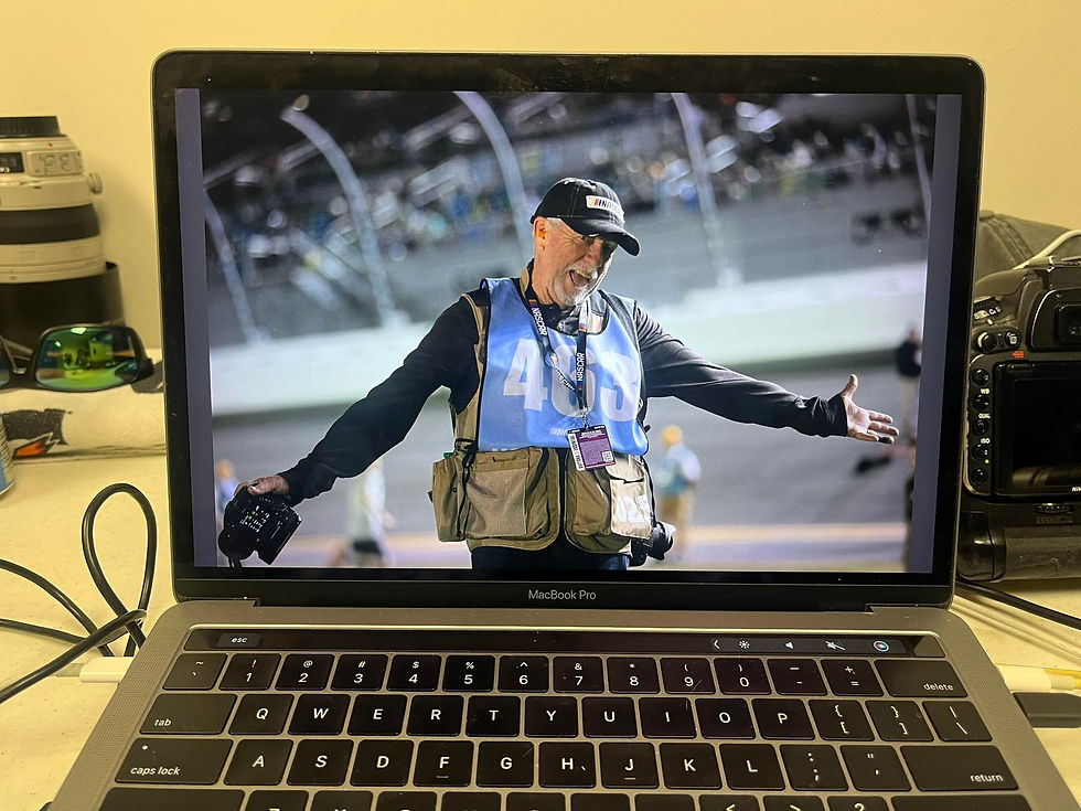 Photographer Brian Cleary at Daytona with his OM SYstem Camera Bodies