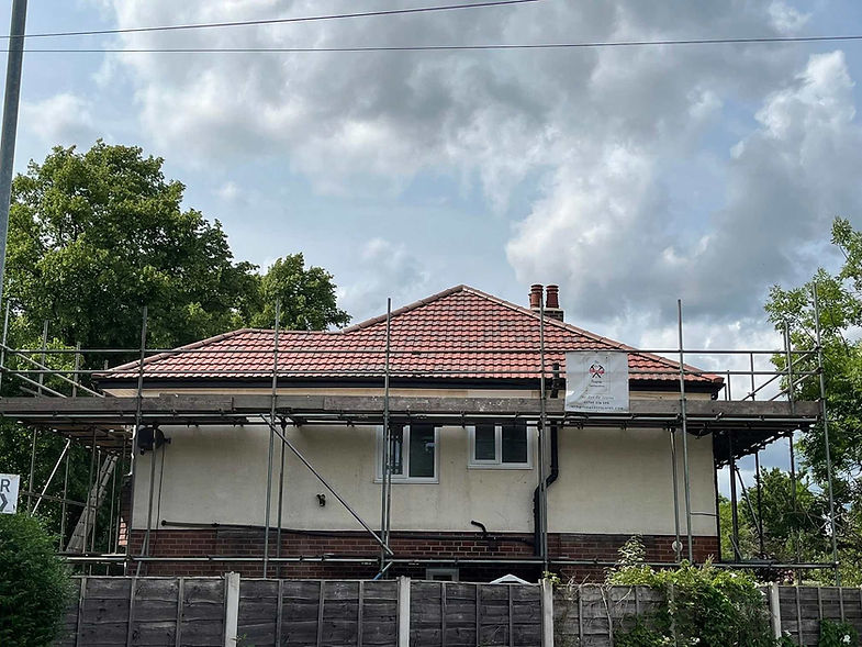 House under construction with scaffolding