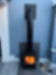 A modern black wood-burning stove