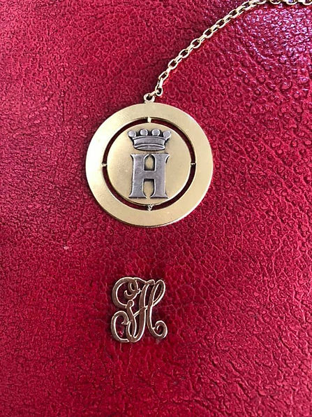 Red leather with metal emblem