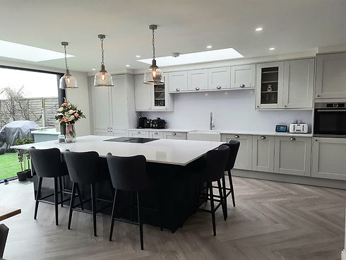 Spacious kitchen extension with central island seating and roof lantern