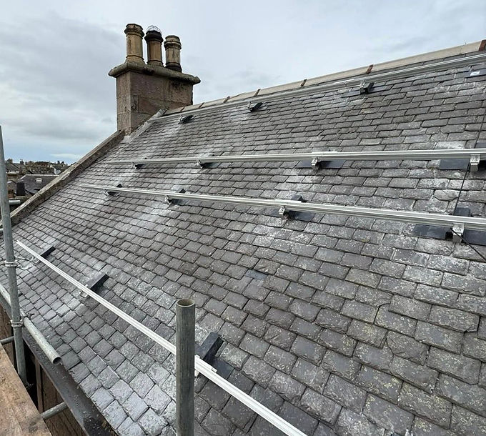 Rooftops of Glasgow, Scotland, featuring a mix of historic and modern roofing designs