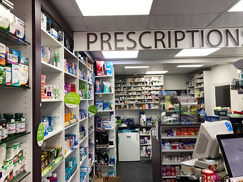 Pharmacy interior with shelves stocked