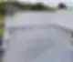 A newly applied waterproof coating on a flat rooftop