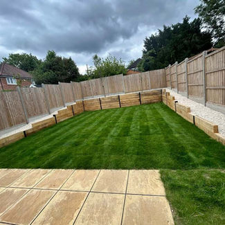 Freshly-lawned backyard with striped grass