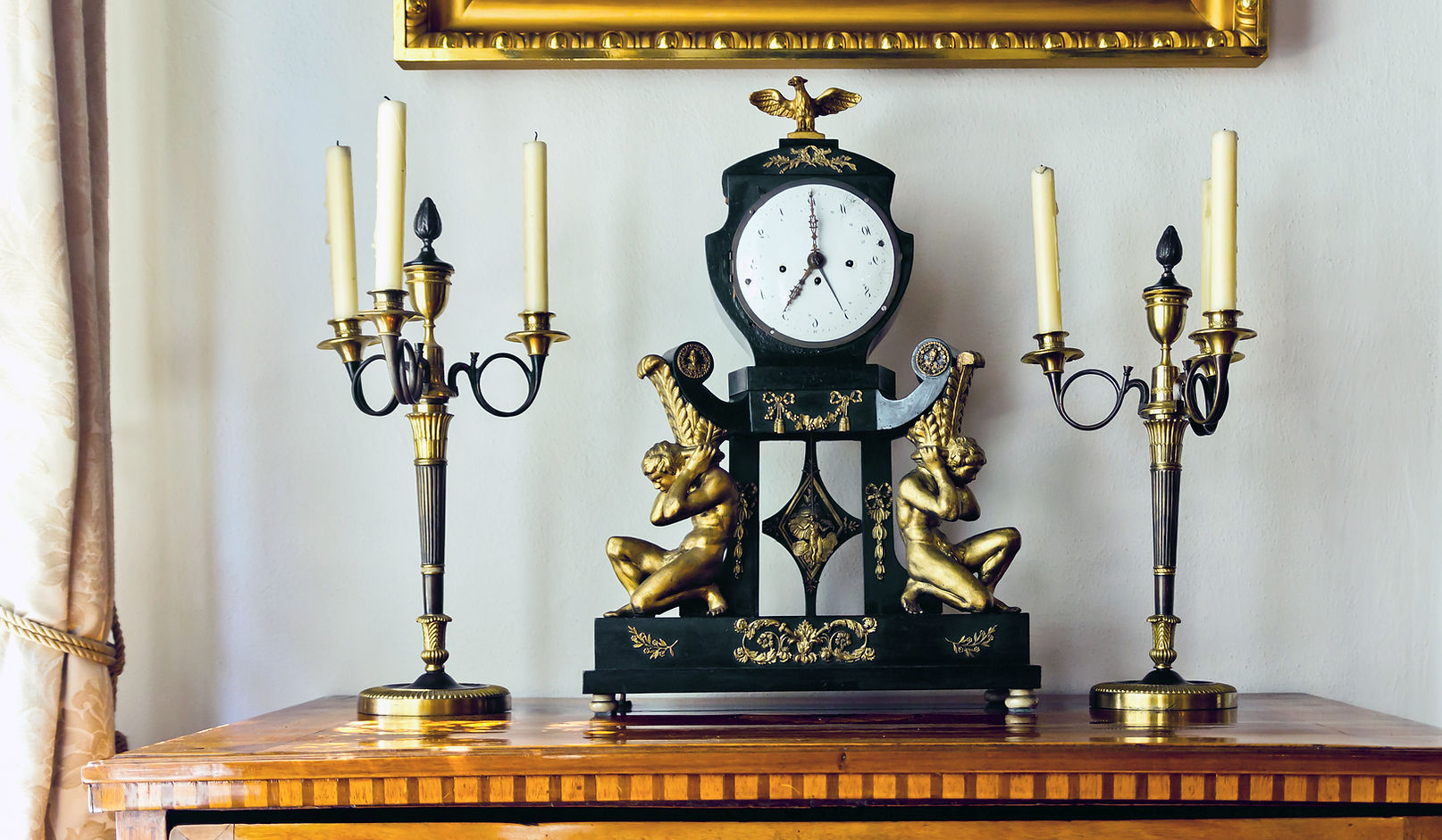 Elegant vintage mantel clock with a white face