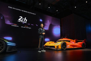 Andre Lotterer delivers a speech for Genesis at 2026 BIMOS.
