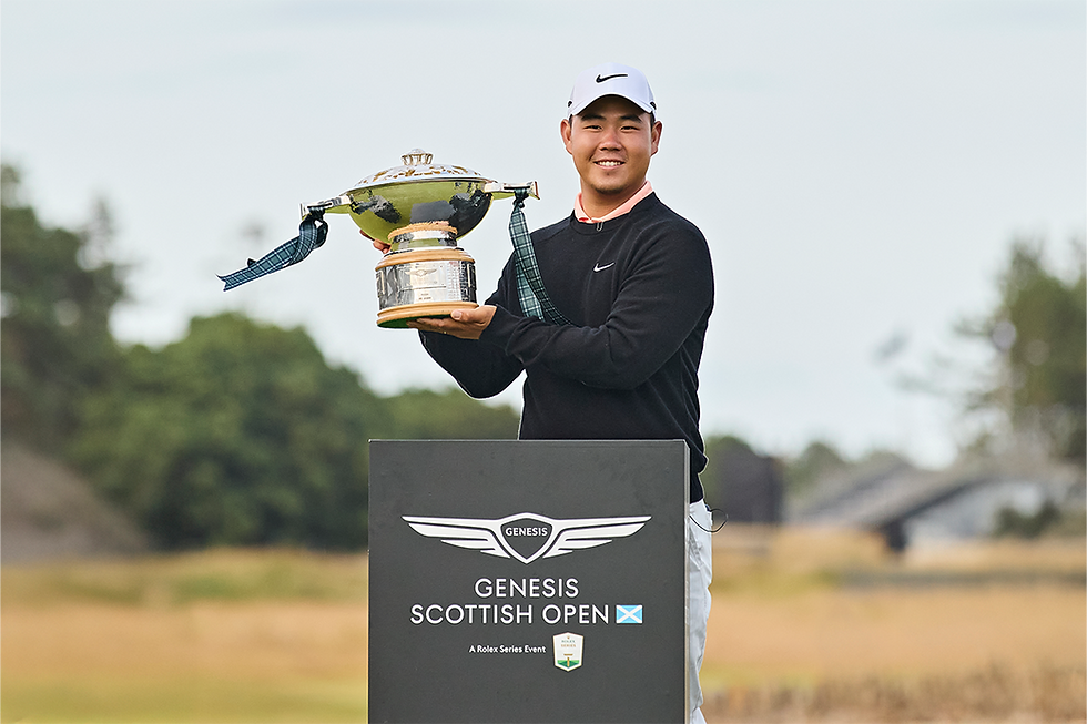 Tom Kim lifting the trophy at the Genesis Scottish Open.