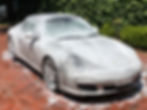 Porsche undergoing full foam pre-wash at home