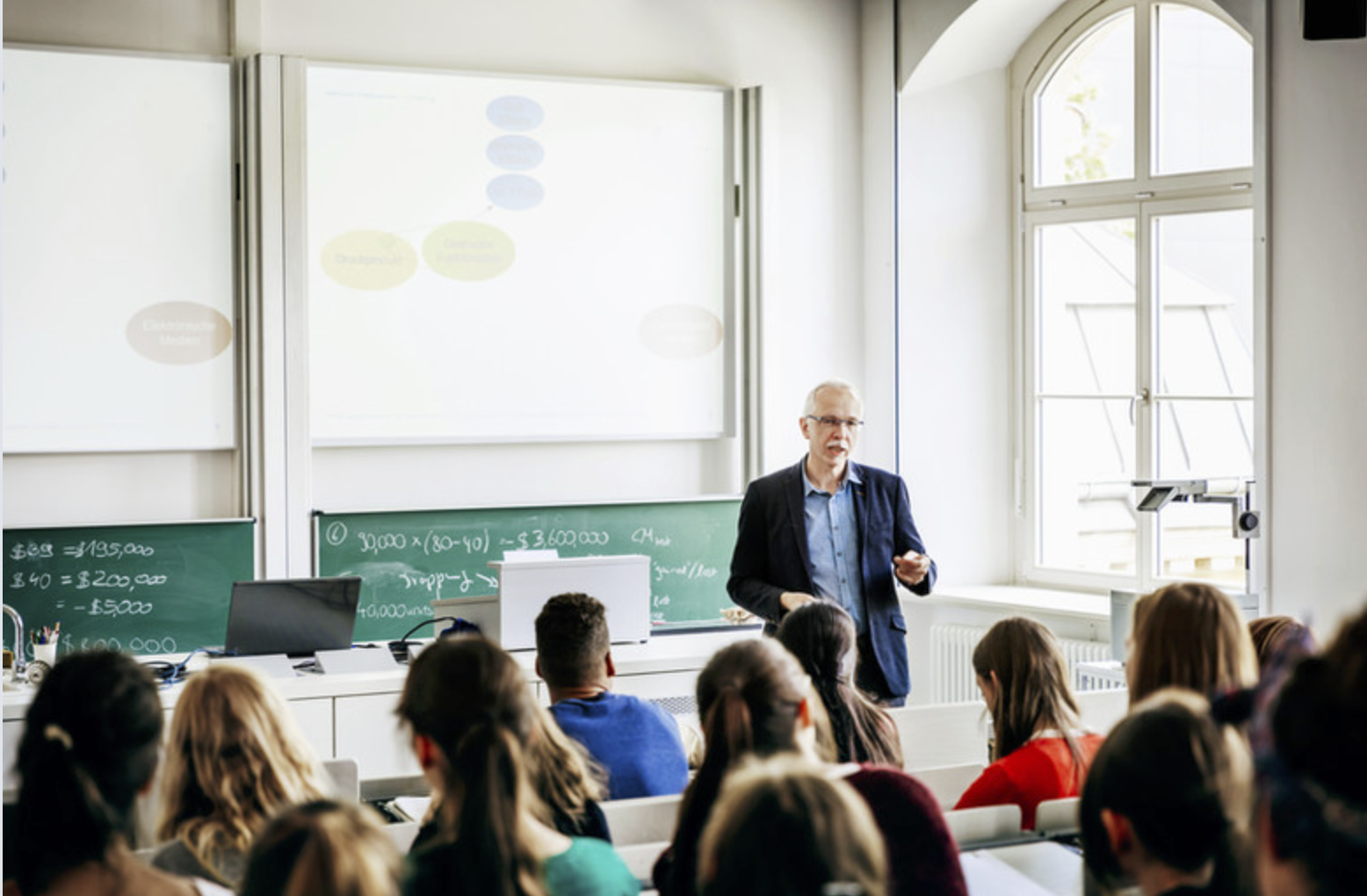 man teaching class