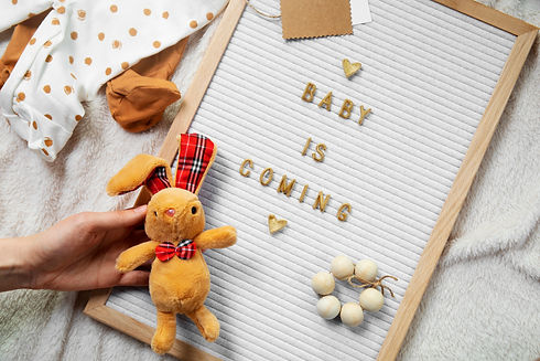 top-view-hand-holding-baby-toy.jpg