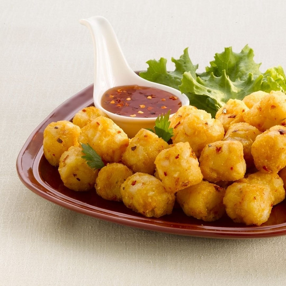 Crispy potato tots with spicy dipping sauce