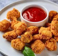 Crispy chicken nuggets with sweet and sour sauce
