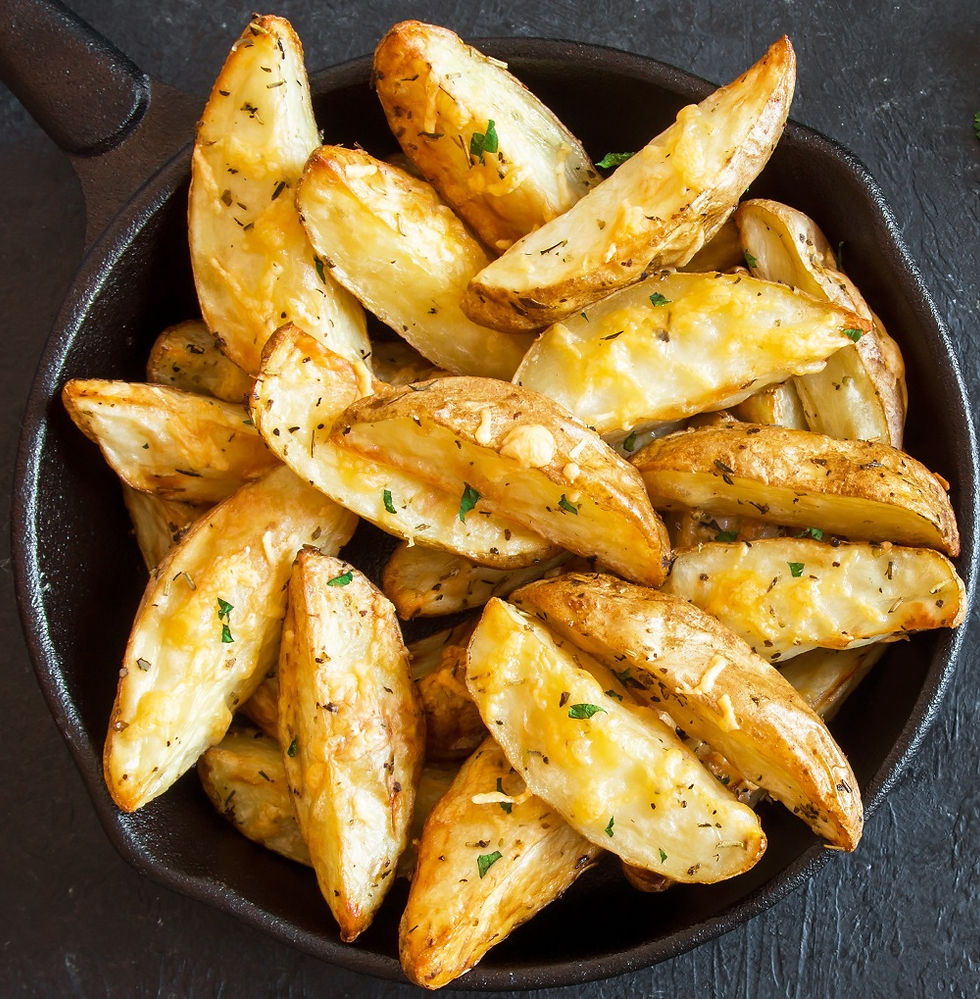 Thumbnail: Seasoned potato wedges in a cast iron skillet