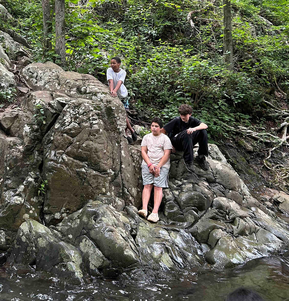 Andrew, Ivan, and Gibran eager to get the go-ahead to splash into Rose River Falls.