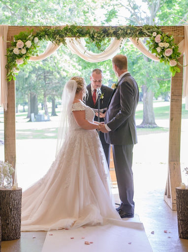 Bride and groom at outdoor wedding ceremony
