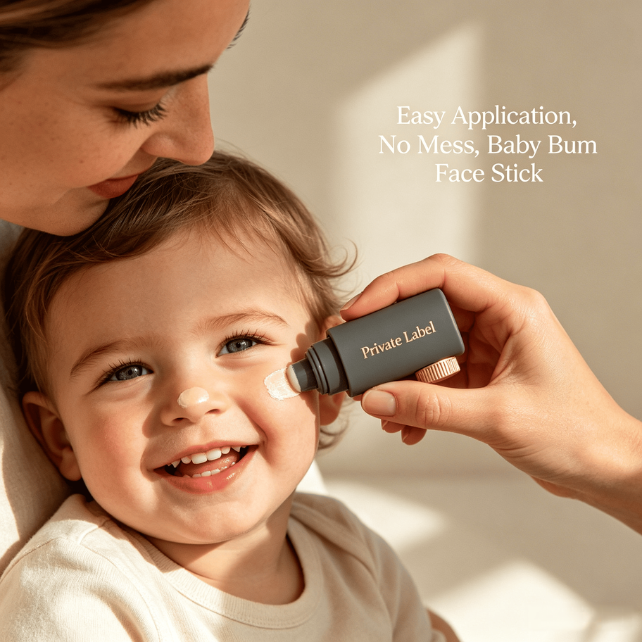 Mother applying Private Label sunscreen stick to baby's face, demonstrating easy, mess-free application for sensitive skin.