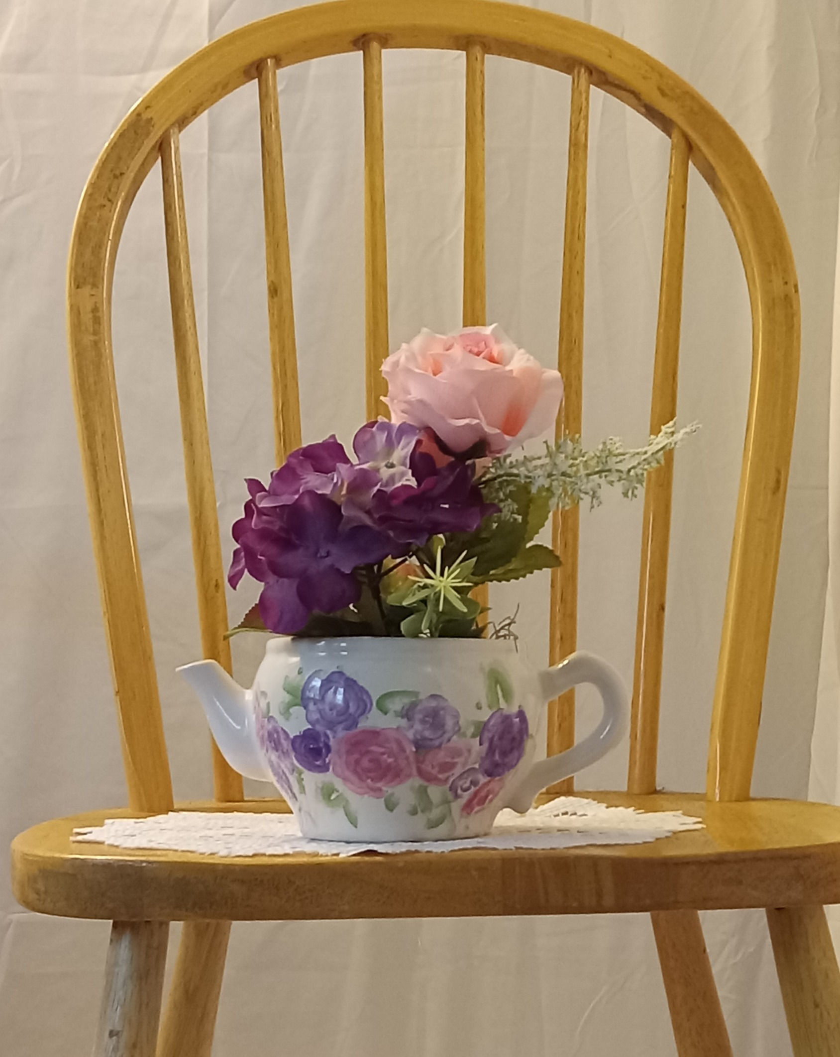 Teapot Of Pink And Purple Flowers