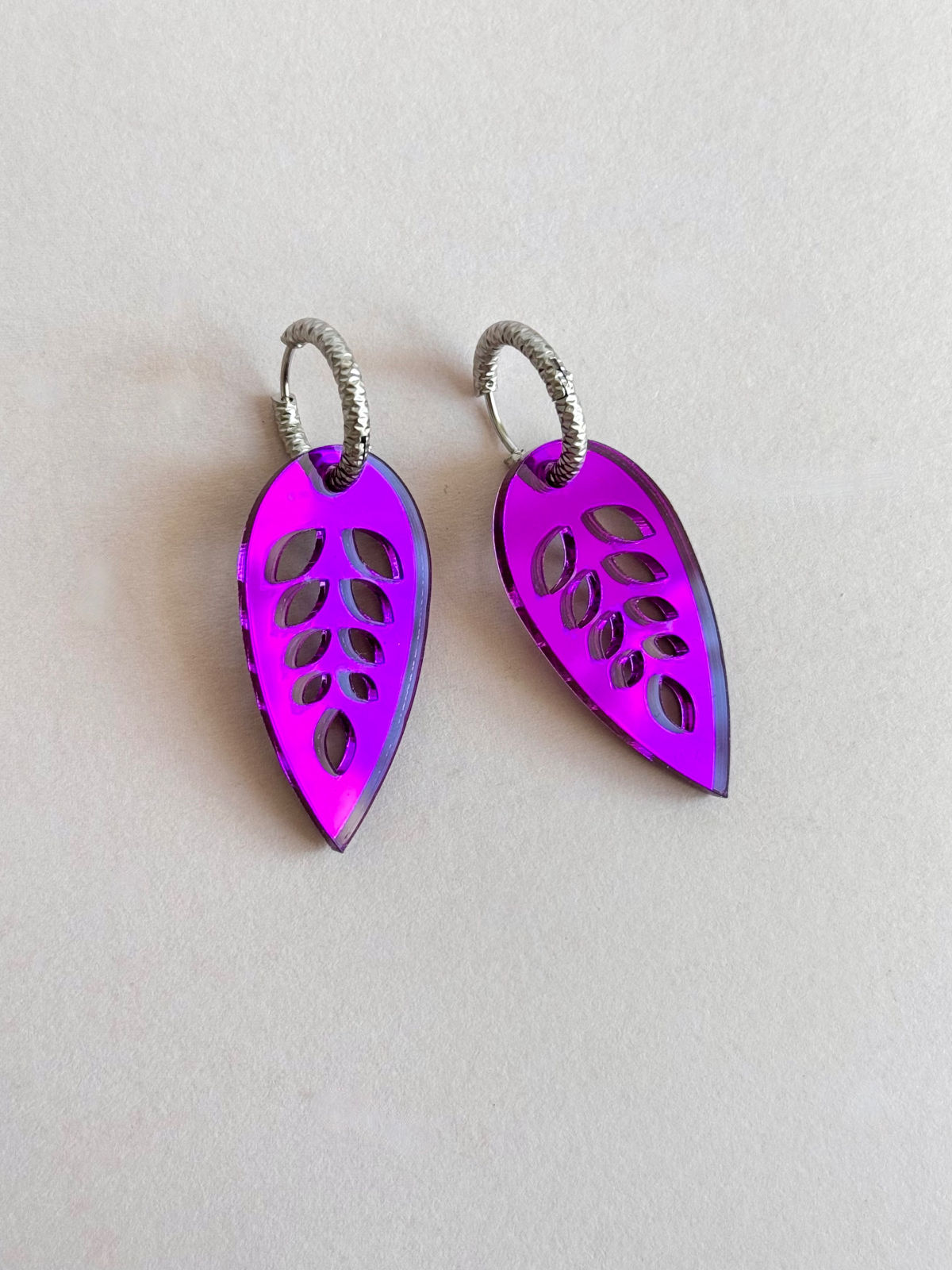 Earrings petals on a violet ring