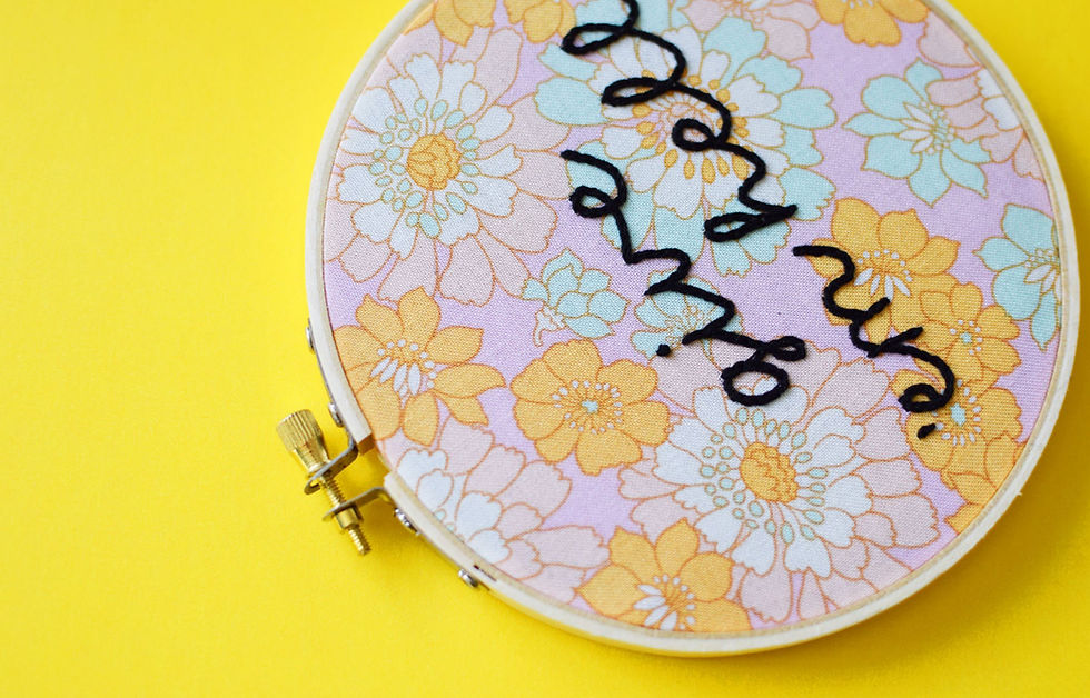 Thumbnail: Embroidered hoop with text saying 