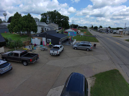 Aerial view of a business and parking lot; Vector Drone Service.