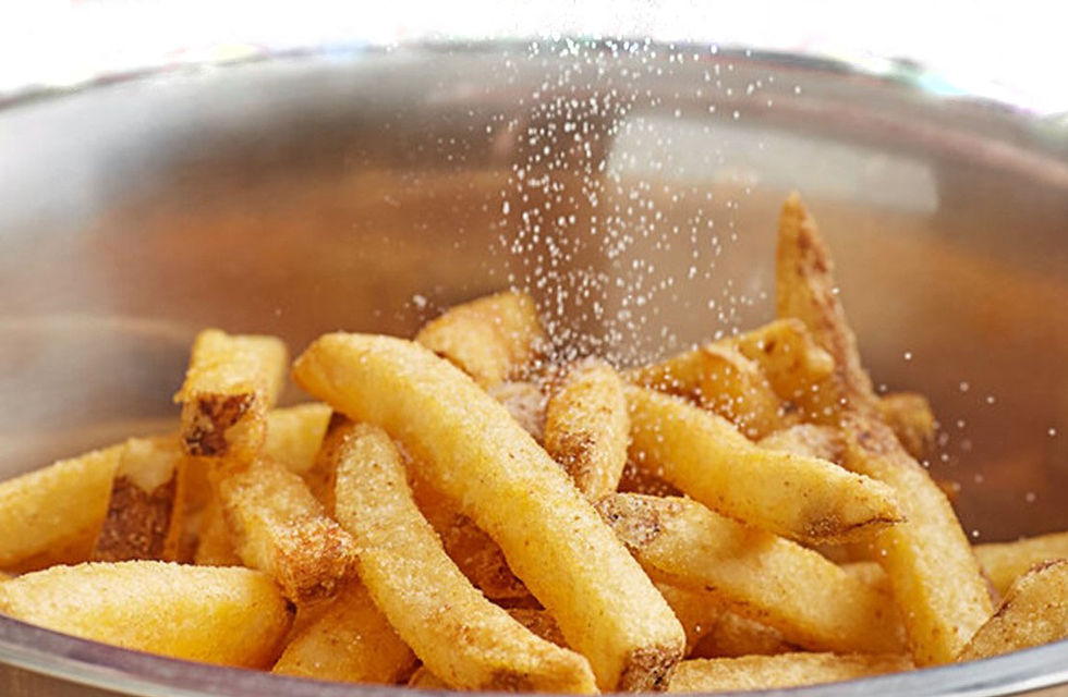 Thumbnail: Sea salt as condiment and seasoning on french fries