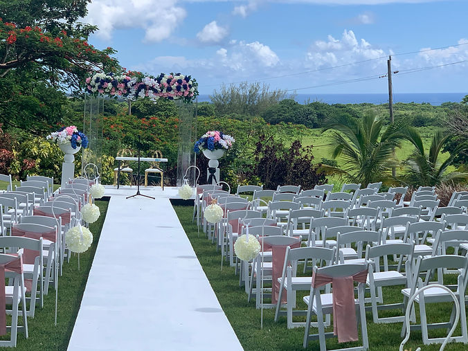 outdoor-wedding-setup-with-seating-arch.jpeg