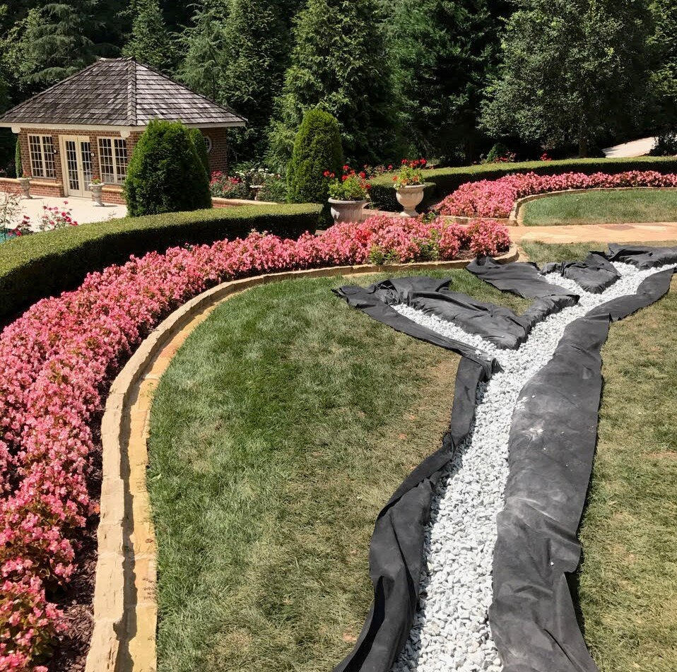 French Drain installed near flowerbed