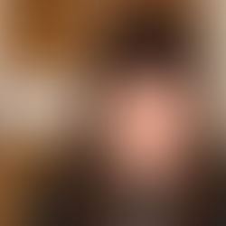 Sari is smiling with a sign in the background that says, "The Parental Edge."