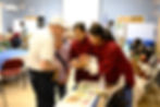 Staff from ZDCLA introduces Chinese calligraphy to attendees. Photo credit of ZDCLA. 