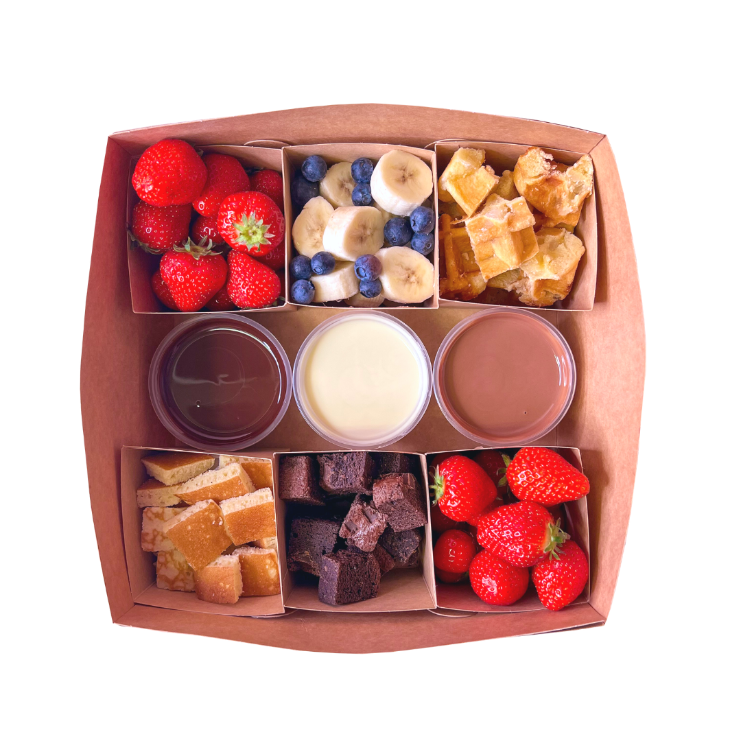 fika i låda medium size with 6 toppings as brownies, waffles, fresh fruits and pancakes, and 3 different chocolates