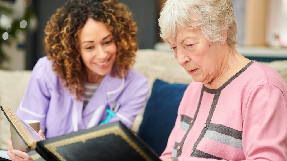 Support worker talking with elderly woman — building real English skills in aged care