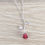 Thumbnail: The Falling Rose of Poetry pendant necklace