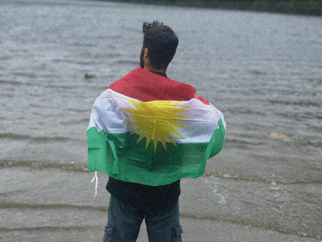 Man covered in a flag