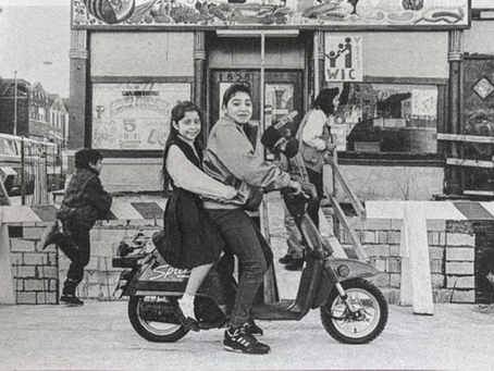 Woman and girl on a motorcycle