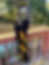This image has gold letters on the scarf that has ASU on it and the hat is gold and black.