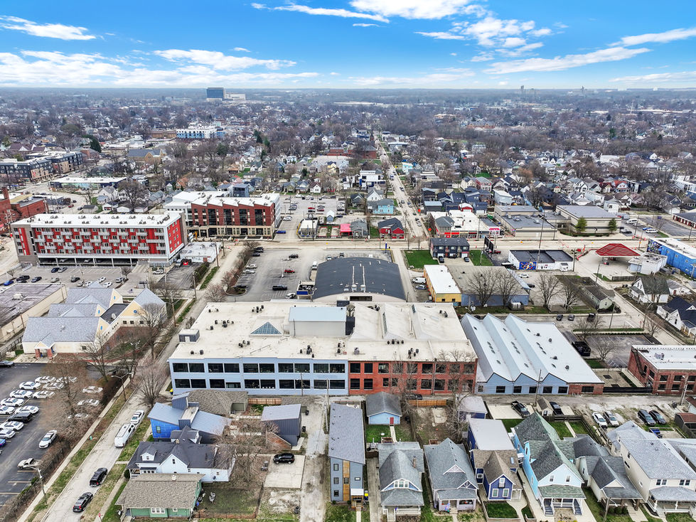 Aerial image capturing urban living in Fountain Square with city skyline backdrop